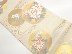 丸に花・流水模様織出し名古屋帯